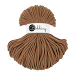 Caramel braided cotton cord skein for macramé and fiber crafts