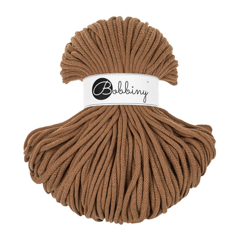 Caramel braided cotton cord skein for macramé and fiber crafts