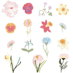 Collection of sixteen pre-stitched spring flower embroidery motifs on white background