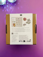 Back of Rico Design embroidery kit box showing contents list and video tutorial QR code