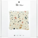Latch hook rug kit with terrazzo cushion design by Rico Design