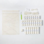 Latch hook rug kit with white landscape design by Rico Design