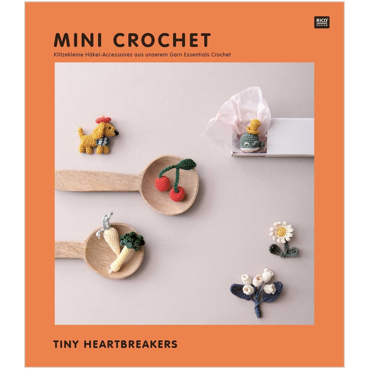 Mini Crochet pattern book cover with tiny amigurumi accessories