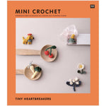 Mini Crochet pattern book cover with tiny amigurumi accessories