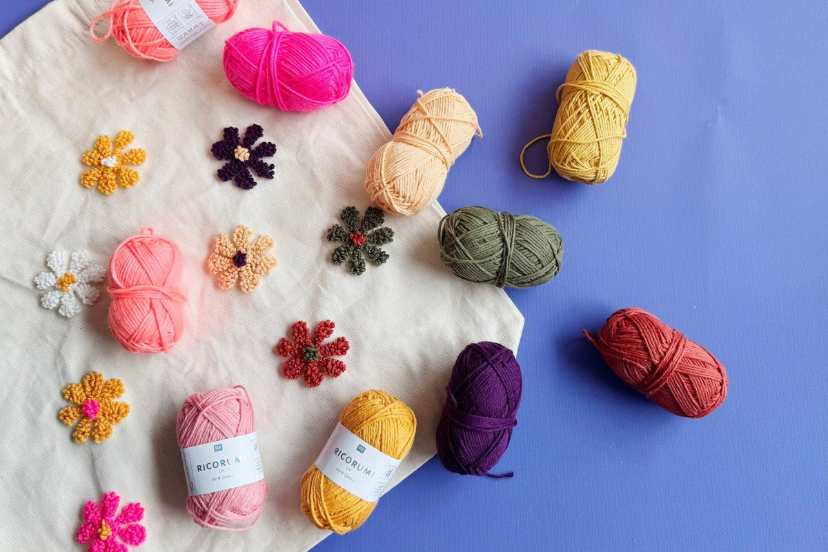 Video tutorial for Punch Needle Set displayed with practice piece and multicolored yarn