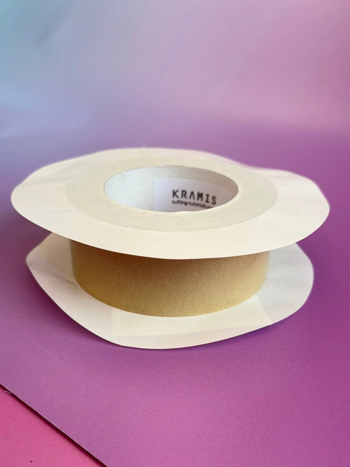 Kramis beige rug edge bonding tape roll with white backing