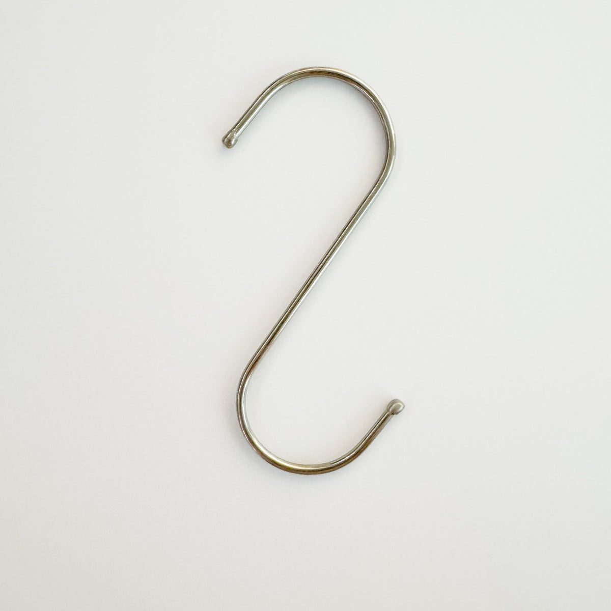 Silver metal S-hook side view, 110mm