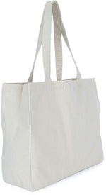 Off-white natural cotton tote bag showing flat base and side profile