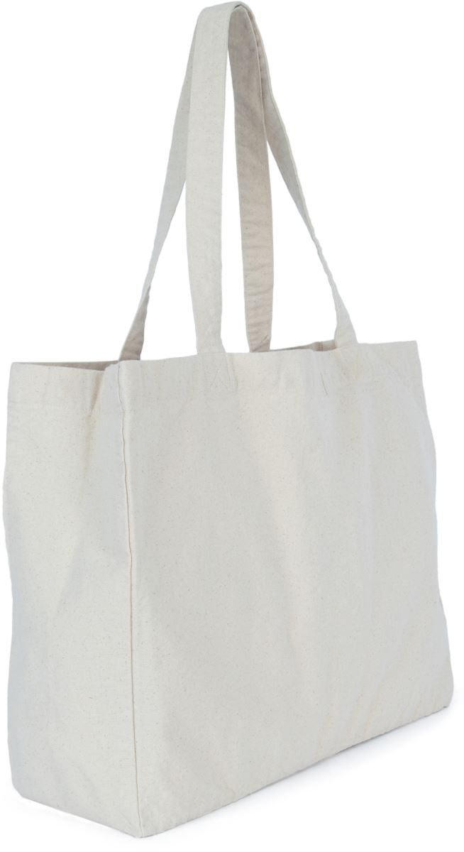 Off-white natural cotton tote bag showing flat base and side profile