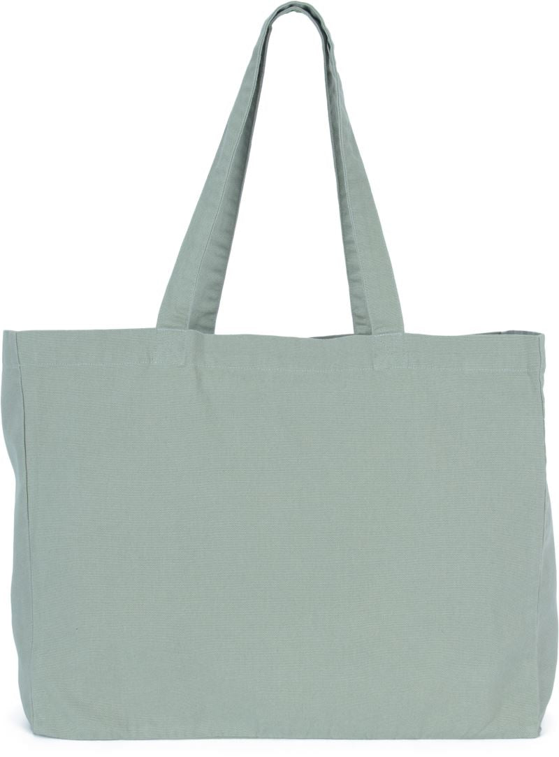 Sage green cotton shopper bag displayed with handles pulled taut