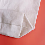 Organic cotton tote bag, close-up of handles
