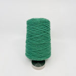 Tufting wool cone in a dusty mauve shade