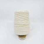 Tufting wool cone with yarn end detail
