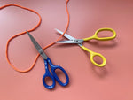 Premium Bendt scissors in blue, close-up