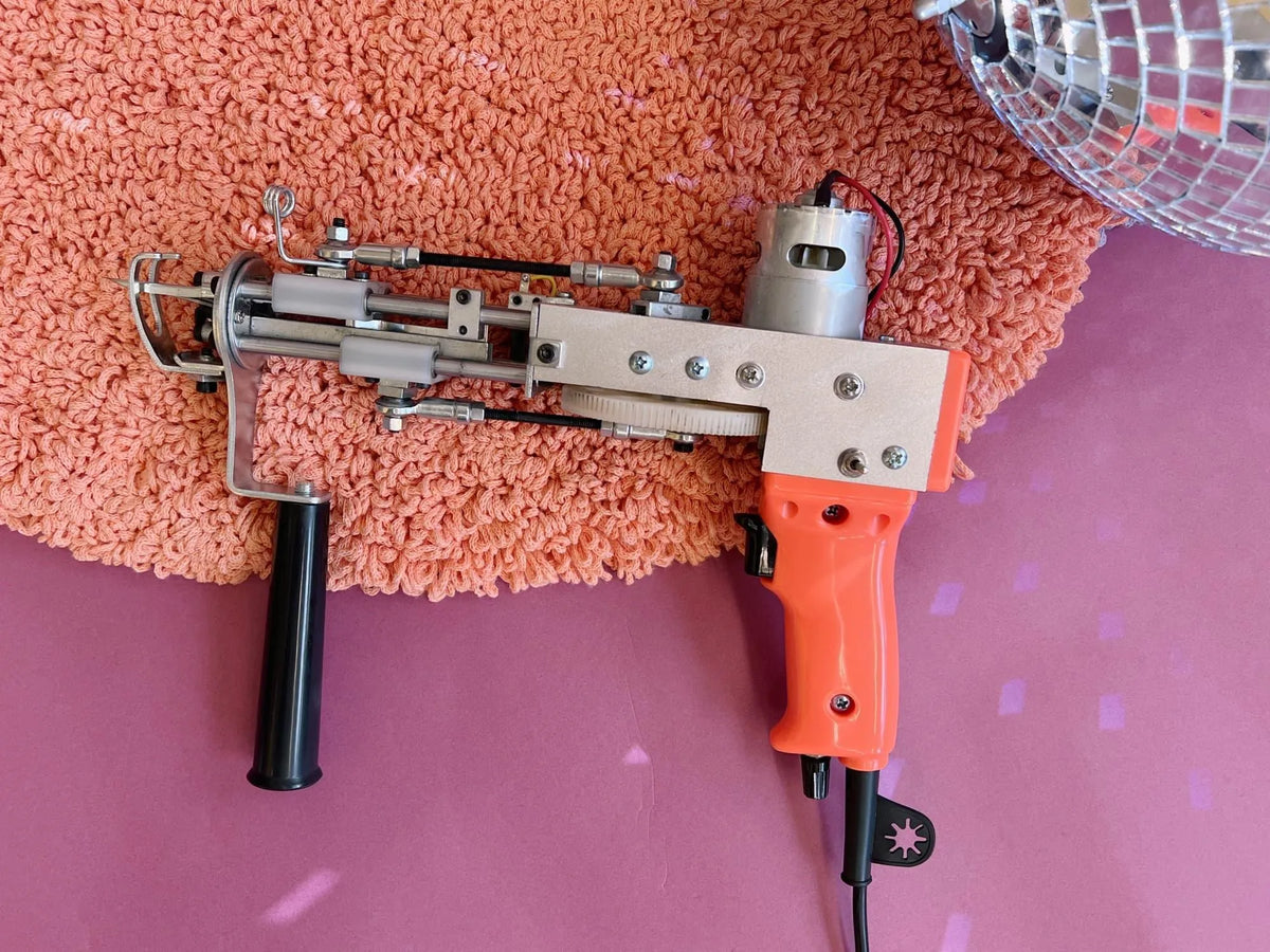 Orange Loop Pile AK-II Tufting Machine with peach textile